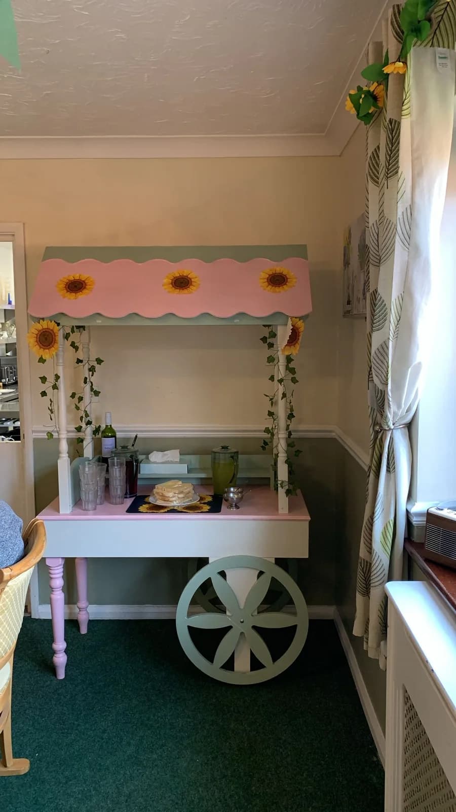 A decorated spring display cart inside Broadland House.